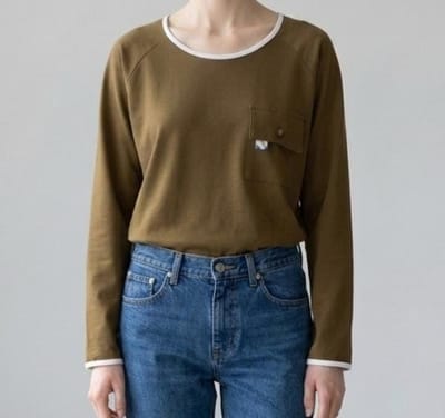 REMERA MANGA RANGLAN CON BOLSILLO LAS TAGUAS